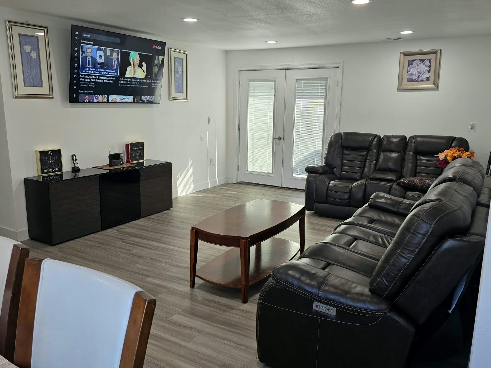 Tevah living room viewed toward the windows and seating